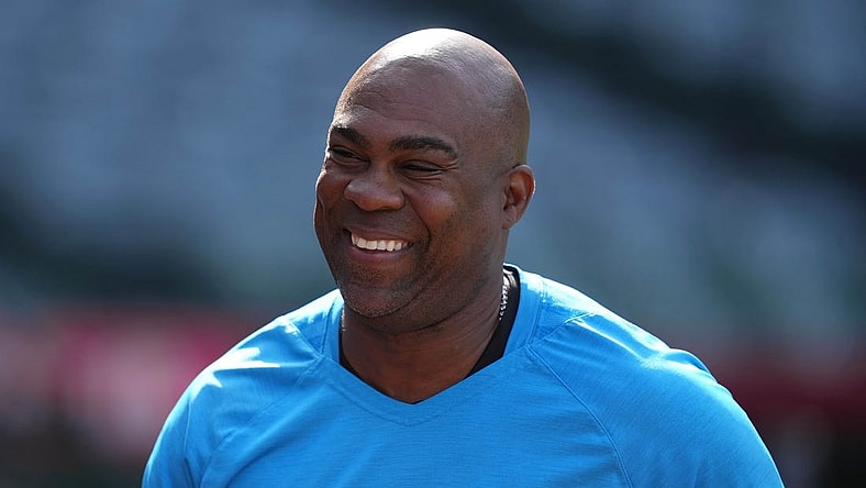 Apr 11, 2022; Anaheim, California, USA; Miami Marlins hitting coach Marcus Thames (33) reacts before the game against the Los Angeles Angels at Angel Stadium. Mandatory Credit: Kirby Lee-USA TODAY Sports