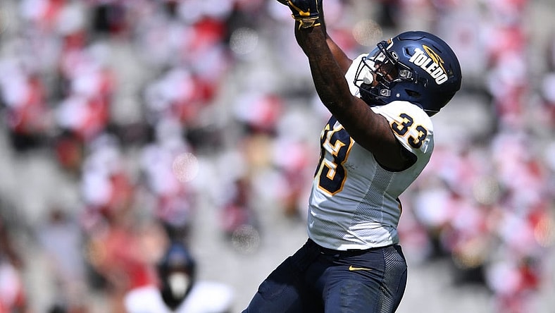 Toledo running back Peny Boone, second in the nation in yards per carry, powers the Rockets into the MAC title game. Mandatory Credit: Orlando Ramirez-USA TODAY Sports