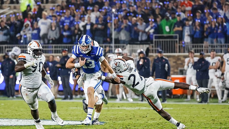 Duke Blue Devils quarterback Riley Leonard had three total TDs to beat the Virginia Cavaliers last season, but his status for Saturday's game is up in the air. Mandatory Credit: Jaylynn Nash-USA TODAY Sports