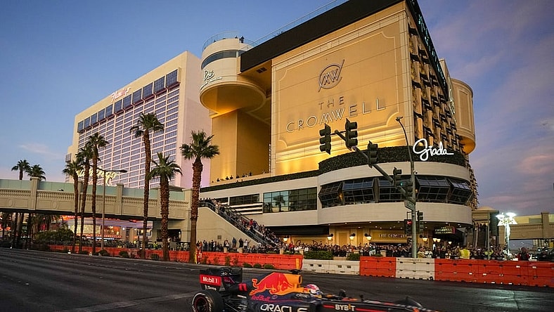 Nov 5, 2022; Las Vegas, Nevada, USA;  Oracle Red Bull Racing driver Sergio Perez drives on the track during the Formula One Las Vegas Grand Prix Launch Party at Las Vegas Strip. Mandatory Credit: Ray Acevedo-USA TODAY Sports