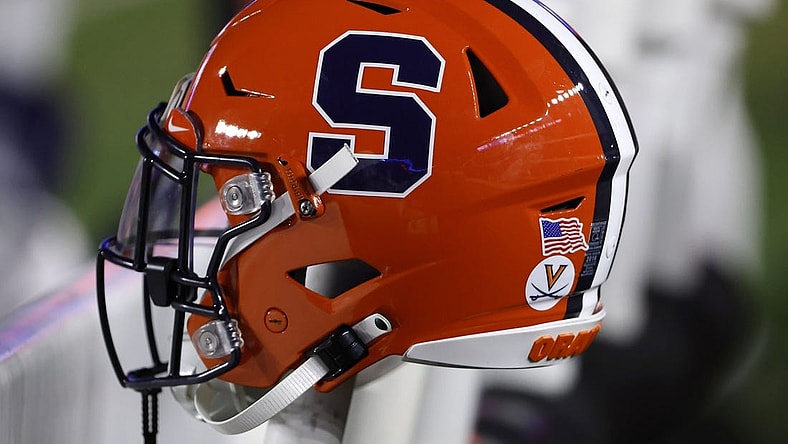 Nov 26, 2022; Chestnut Hill, Massachusetts, USA; The logo of the Syracuse Orange is seen on a helmet during the second half of their game against the Boston College Eagles at Alumni Stadium. Mandatory Credit: Winslow Townson-USA TODAY Sports