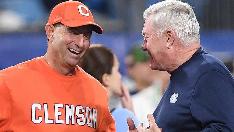 Clemson head coach Dabo Swinney and North Carolina Coach Mack Brown talk before the ACC Championship football game with North Carolina at Bank of America Stadium in Charlotte, North Carolina Saturday, Dec 3, 2022.

Clemson Tigers Football Vs North Carolina Tar Heels Acc Championship Charlotte Nc