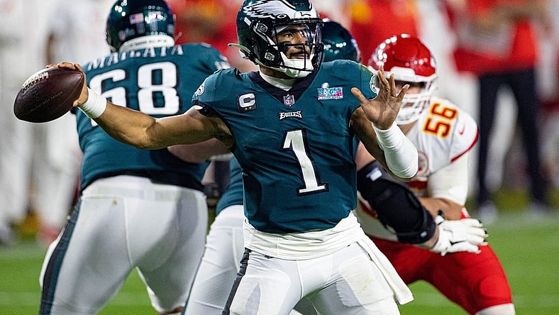 Feb 12, 2023; Glendale, Arizona, US; Philadelphia Eagles quarterback Jalen Hurts (1) throws the ball against the Kansas City Chiefs in Super Bowl LVII at State Farm Stadium. Mandatory Credit: Bill Streicher-USA TODAY Sports