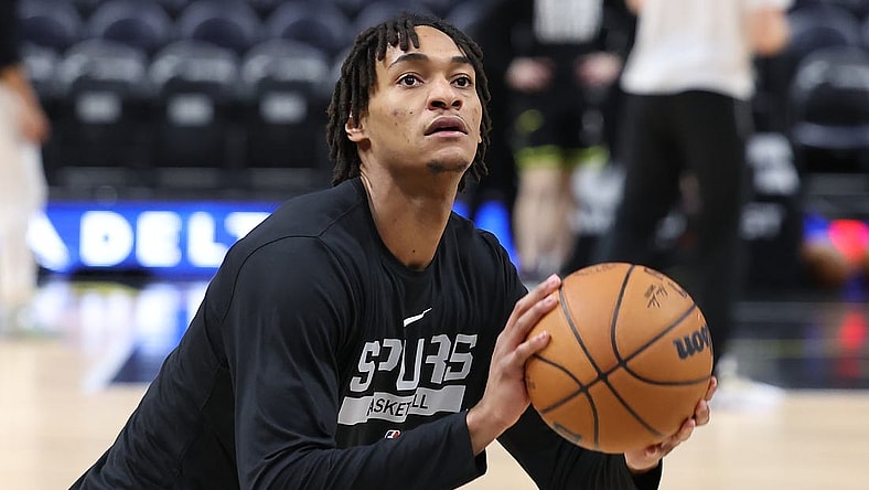 Feb 28, 2023; Salt Lake City, Utah, USA; San Antonio Spurs guard Devin Vassell (24) warms up before a game against the Utah Jazz at Vivint Arena. Mandatory Credit: Rob Gray-USA TODAY Sports