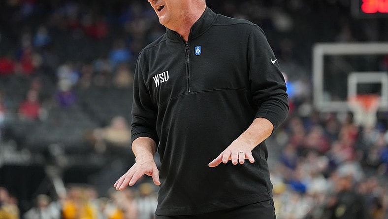 Mar 8, 2023; Las Vegas, NV, USA; Washington State Cougars head coach Kyle Smith talks to an official before a free throw attempt by the California Golden Bears during the first half at T-Mobile Arena. Mandatory Credit: Stephen R. Sylvanie-USA TODAY Sports