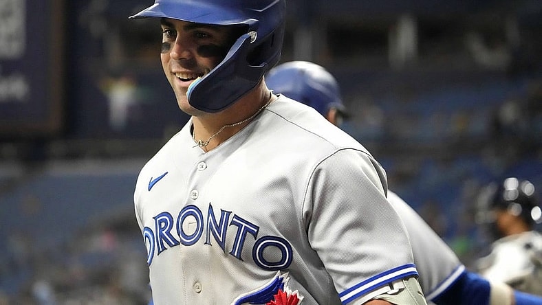 May 22, 2023; St. Petersburg, Florida, USA; Toronto Blue Jays left fielder Whit Merrifield (15) reacts after hitting a home run against the Tampa Bay Rays during the fourth inning at Tropicana Field. Mandatory Credit: Dave Nelson-USA TODAY Sports