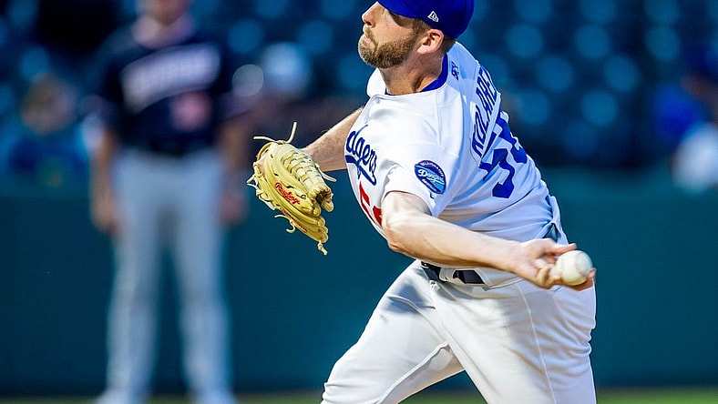 Oklahoma City Dodgers pitcher Adam Kolarek (56) pitches during a Minor League Baseball game between the Oklahoma City Dodgers and the Las Vegas Aviators at Chickasaw Bricktown Ballpark in Oklahoma City on Wednesday, June 21, 2023.