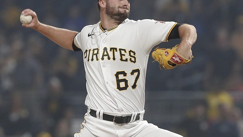 Jun 28, 2023; Pittsburgh, Pennsylvania, USA;  Pittsburgh Pirates relief pitcher Cody Bolton (67) pitches against the San Diego Padres during the ninth inning at PNC Park. Pittsburgh won 7-1. Mandatory Credit: Charles LeClaire-USA TODAY Sports