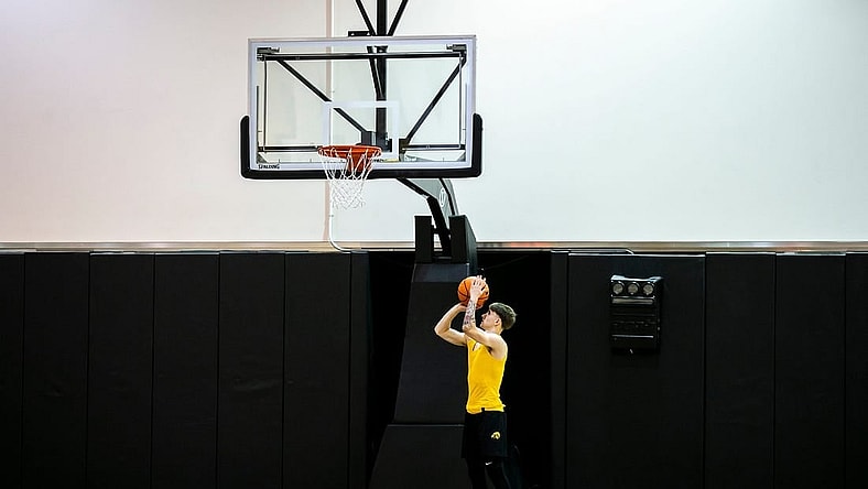 Iowa guard Brock Harding warms up before a summer practice at Carver-Hawkeye Arena in Iowa City, Iowa.