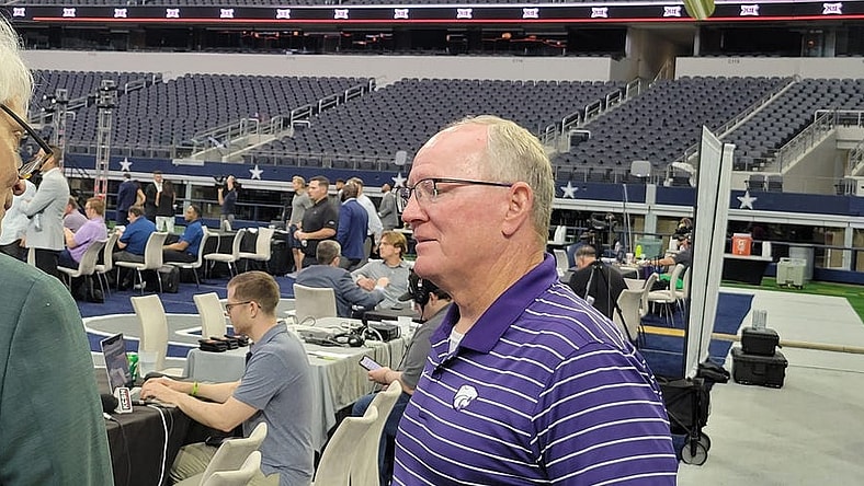 Kansas State athletics director Gene Taylor talks to a reporter Thursday during the second of Big 12 media days at AT&T Stadium in Arlington, Texas.