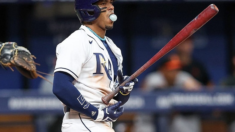 Jul 20, 2023; St. Petersburg, Florida, USA;  Tampa Bay Rays shortstop Wander Franco (5) reacts after striking out against the Baltimore Orioles in the ninth inning at Tropicana Field. Mandatory Credit: Nathan Ray Seebeck-USA TODAY Sports