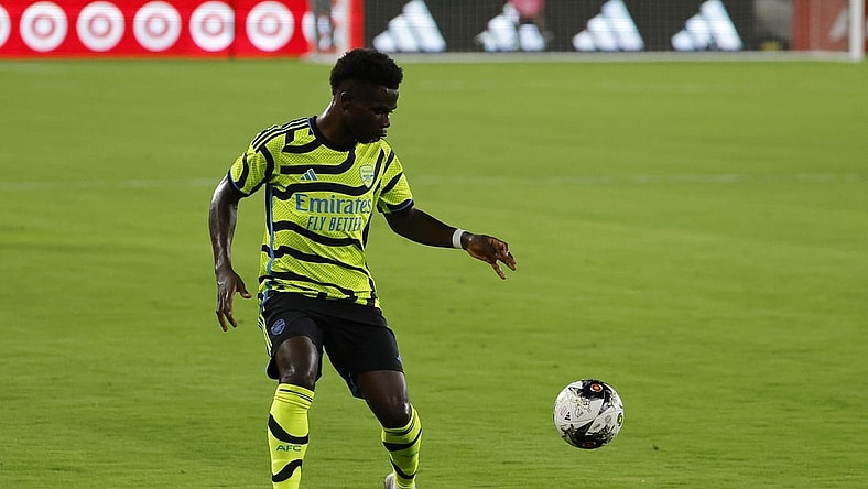 Jul 19, 2023; Washington, DC, USA; Arsenal midfielder Bukayo Saka (7) dribbles the ball against MLS All-Stars in the 2023 MLS All Star Game at Audi Field. Mandatory Credit: Geoff Burke-USA TODAY Sports