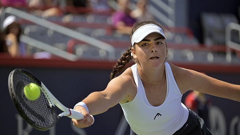Aug 5, 2023; Montreal, Quebec, Canada; Marina Stakusic (CAN) hits a forehand against Alycia Parks (USA) (not pictured) in first round qualifying play at IGA Stadium. Mandatory Credit: Eric Bolte-USA TODAY Sports