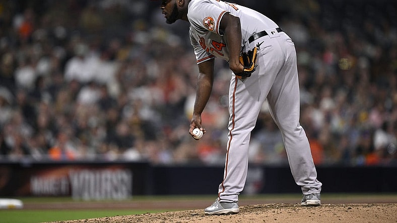 Aug 14, 2023; San Diego, California, USA; Baltimore Orioles relief pitcher Felix Bautista (74) prepares to pitch against the San Diego Padres during the ninth inning at Petco Park. Mandatory Credit: Orlando Ramirez-USA TODAY Sports