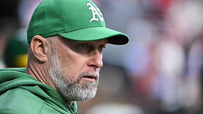 Aug 15, 2023; St. Louis, Missouri, USA;  Oakland Athletics manager Mark Kotsay (7) looks on from the dugout before a game against the St. Louis Cardinals at Busch Stadium. Mandatory Credit: Jeff Curry-USA TODAY Sports