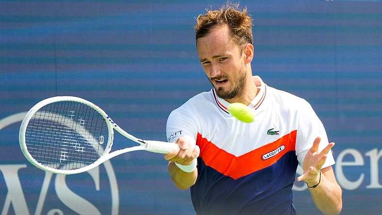 Daniil Medvedev, of Russia, hits a forehand to Lorenzo Musetti, of Italy, during the Western & Southern Open at the Lindner Family Tennis Center in Mason on Wednesday, Aug. 16, 2023. Medvedev won 6-3, 6-2.