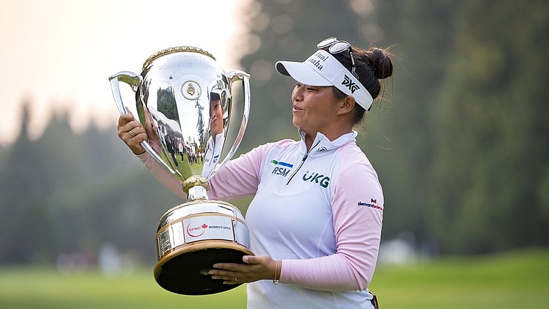Aug 27, 2023; Vancouver, British Columbia, CAN; Megan Khang holds the championship trophy after the final round of the CPKC Women's Open golf tournament at Shaughnessy Golf & Country Club. Mandatory Credit: Bob Frid-USA TODAY Sports