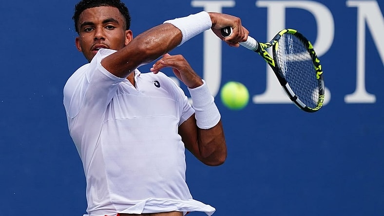Aug 29, 2023; Flushing, NY, USA;  Arthur Fils of France hits a shot against Tallon Griekspoor of Netherlands on day two of the 2023 U.S. Open tennis tournament at the USTA Billie Jean King National Tennis Center. Mandatory Credit: Jerry Lai-USA TODAY Sports