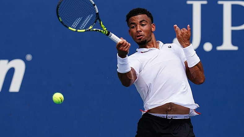 Aug 29, 2023; Flushing, NY, USA;  Arthur Fils of France hits a shot against Tallon Griekspoor of Netherlands on day two of the 2023 U.S. Open tennis tournament at the USTA Billie Jean King National Tennis Center. Mandatory Credit: Jerry Lai-USA TODAY Sports
