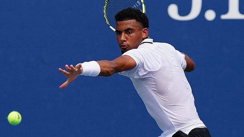 Aug 29, 2023; Flushing, NY, USA;  Arthur Fils of France hits a shot against Tallon Griekspoor of Netherlands on day two of the 2023 U.S. Open tennis tournament at the USTA Billie Jean King National Tennis Center. Mandatory Credit: Jerry Lai-USA TODAY Sports