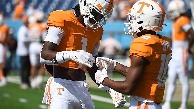 Sep 2, 2023; Nashville, Tennessee, USA; Tennessee Volunteers wide receiver Dont'e Thornton Jr. (1) and wide receiver Squirrel White (10) before the game against the Virginia Cavaliers at Nissan Stadium. Mandatory Credit: Christopher Hanewinckel-USA TODAY Sports