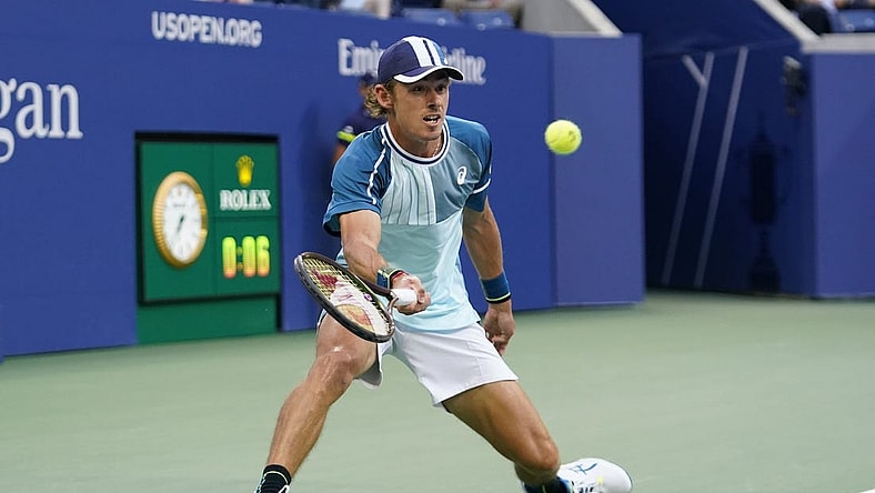 Sep 4, 2023; Flushing, NY, USA; Alex de Minaur of Australia hits to Daniil Medvedev on day eight of the 2023 U.S. Open tennis tournament at USTA Billie Jean King National Tennis Center. Mandatory Credit: Danielle Parhizkaran-USA TODAY Sports