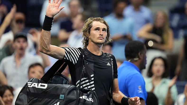 Sep 6, 2023; Flushing, NY, USA; Alexander Zverev of Germany waves to the crowd after losing to Carlos Alcaraz of Spain on day ten of the 2023 U.S. Open tennis tournament at USTA Billie Jean King National Tennis Center. Mandatory Credit: Danielle Parhizkaran-USA TODAY Sports