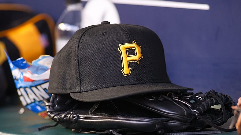 Sep 8, 2023; Atlanta, Georgia, USA; A detailed view of a Pittsburgh Pirates hat and glove before a game against the Pittsburgh Pirates in the first inning at Truist Park. Mandatory Credit: Brett Davis-USA TODAY Sports