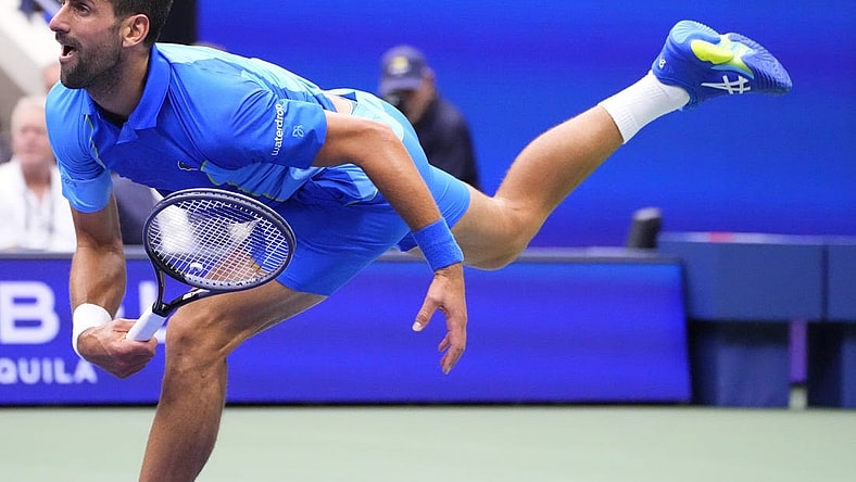 Sep 10, 2023; Flushing, NY, USA; Novak Djokovic of Serbia serves against Daniil Medvedev (not pictured) in the men's singles final on day fourteen of the 2023 U.S. Open tennis tournament at USTA Billie Jean King National Tennis Center. Mandatory Credit: Robert Deutsch-USA TODAY Sports