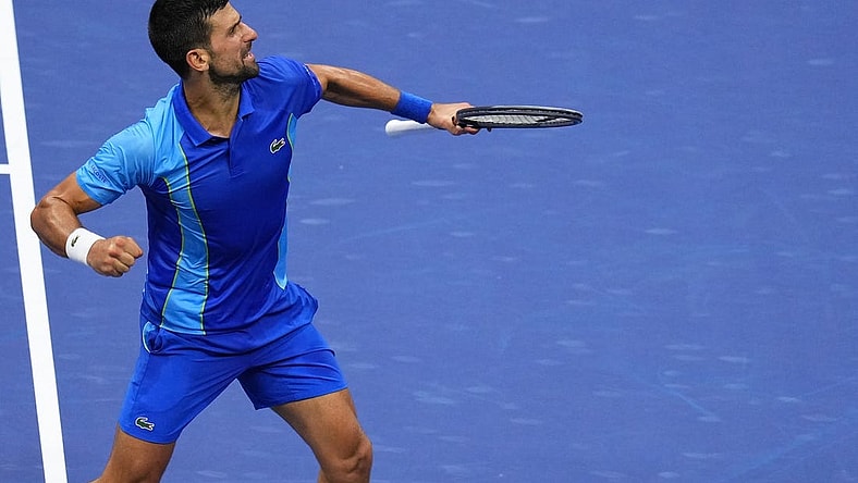 Sep 10, 2023; Flushing, NY, USA; Novak Djokovic of Serbia reacts after winning a point against Daniil Medvedev (not pictured) in the men's singles final in the men's singles final on day fourteen of the 2023 U.S. Open tennis tournament at USTA Billie Jean King National Tennis Center. Mandatory Credit: Danielle Parhizkaran-USA TODAY Sports
