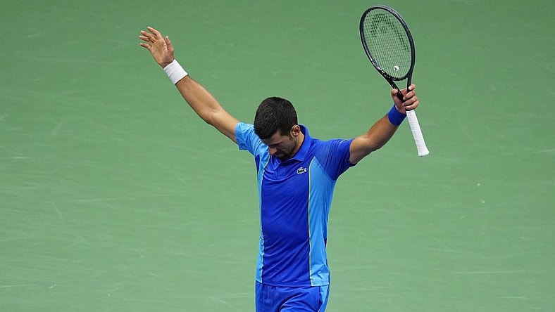 Sep 10, 2023; Flushing, NY, USA; Novak Djokovic of Serbia reacts after winning a point against Daniil Medvedev (not pictured) in the men's singles final in the men's singles final on day fourteen of the 2023 U.S. Open tennis tournament at USTA Billie Jean King National Tennis Center. Mandatory Credit: Danielle Parhizkaran-USA TODAY Sports
