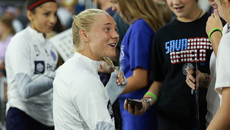 Sep 15, 2023; Louisville, Kentucky, USA; Racing Louisville FC midfielder Maddie Pokorny (17) speaks with fans following the match against the Houston Dash at Lynn Family Stadium. Mandatory Credit: EM Dash-USA TODAY Sports