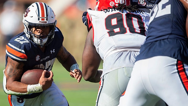 Auburn Tigers running back Jarquez Hunter (27) runs the ball as Auburn Tigers take on Georgia Bulldogs at Jordan-Hare Stadium in Auburn, Ala., on Saturday, Sept. 30, 2023. Georgia Bulldogs and Auburn Tigers are tied 10-10 at halftime.