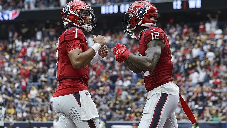 Oct 1, 2023; Houston, Texas, USA; Houston Texans quarterback C.J. Stroud (7) celebrates with wide receiver Nico Collins (12) after a touchdown during the game against the Pittsburgh Steelers at NRG Stadium. Mandatory Credit: Troy Taormina-USA TODAY Sports