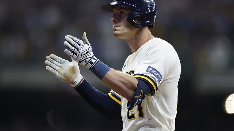Oct 4, 2023; Milwaukee, Wisconsin, USA; Milwaukee Brewers player Mark Canha (21) reacts after hitting a single in the eighth inning against the Arizona Diamondbacks during game two of the Wildcard series for the 2023 MLB playoffs at American Family Field. Mandatory Credit: Kamil Krzaczynski-USA TODAY Sports