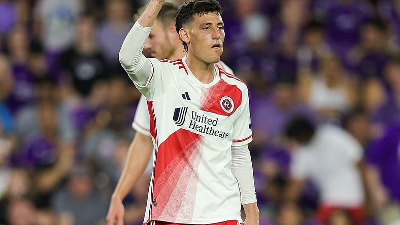 Oct 7, 2023; Orlando, Florida, USA; New England Revolution forward Tomas Chancalay (5) reacts after breaking a shoe against Orlando City SC in the second half at Exploria Stadium. Mandatory Credit: Nathan Ray Seebeck-USA TODAY Sports