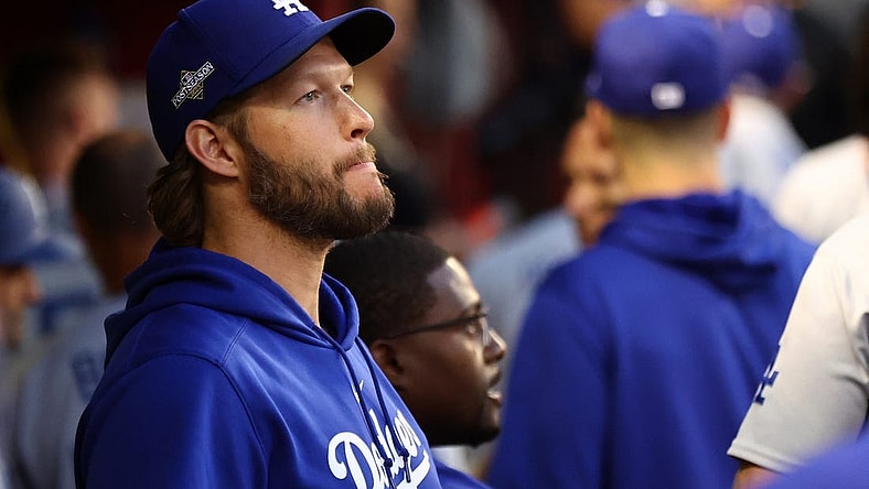 Oct 11, 2023; Phoenix, Arizona, USA; Los Angeles Dodgers starting pitcher Clayton Kershaw (22) in the dug out before during three of the NLDS for the 2023 MLB playoffs against the Arizona Diamondbacks at Chase Field. Mandatory Credit: Mark J. Rebilas-USA TODAY Sports