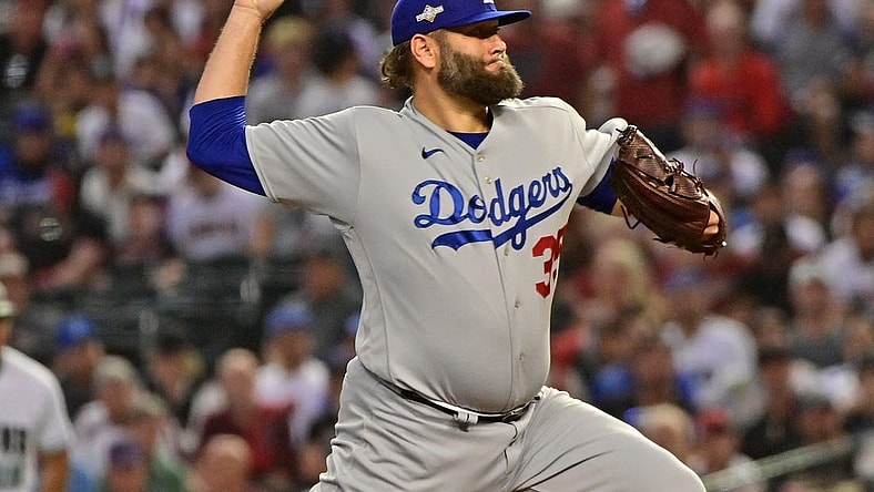 Oct 11, 2023; Phoenix, Arizona, USA; Los Angeles Dodgers starting pitcher Lance Lynn (35) throws a pitch against the Arizona Diamondbacks in the first inning for game three of the NLDS for the 2023 MLB playoffs at Chase Field. Mandatory Credit: Matt Kartozian-USA TODAY Sports