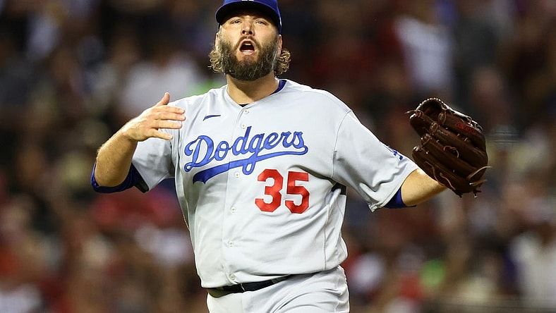 Oct 11, 2023; Phoenix, Arizona, USA; Los Angeles Dodgers starting pitcher Lance Lynn (35) reacts against the Arizona Diamondbacks in the second inning for game three of the NLDS for the 2023 MLB playoffs at Chase Field. Mandatory Credit: Mark J. Rebilas-USA TODAY Sports