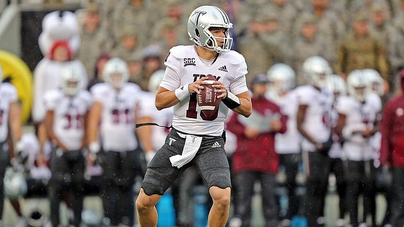 Oct 14, 2023; West Point, New York, USA; Troy Trojans quarterback Gunnar Watson (18) looks to pass against the Army Black Knights during the first half at Michie Stadium. Mandatory Credit: Danny Wild-USA TODAY Sports
