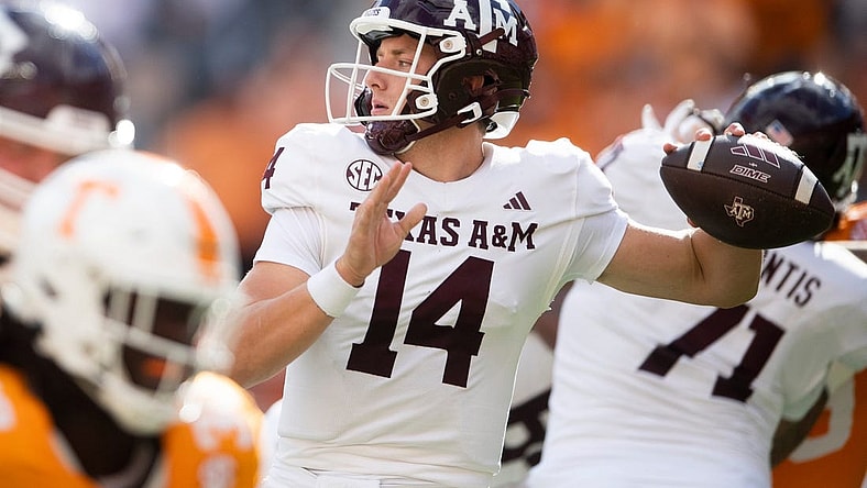 Texas A&M quarterback Max Johnson (14) throws a pass during a football game between Tennessee and Texas A&M at Neyland Stadium in Knoxville, Tenn., on Saturday, Oct. 14, 2023.