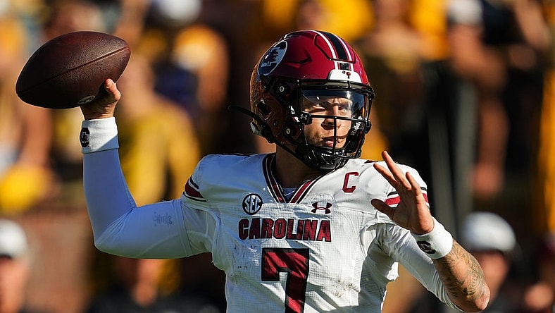 Oct 21, 2023; Columbia, Missouri, USA; South Carolina Gamecocks quarterback Spencer Rattler (7) throws a pass against the Missouri Tigers during the first half at Faurot Field at Memorial Stadium. Mandatory Credit: Jay Biggerstaff-USA TODAY Sports