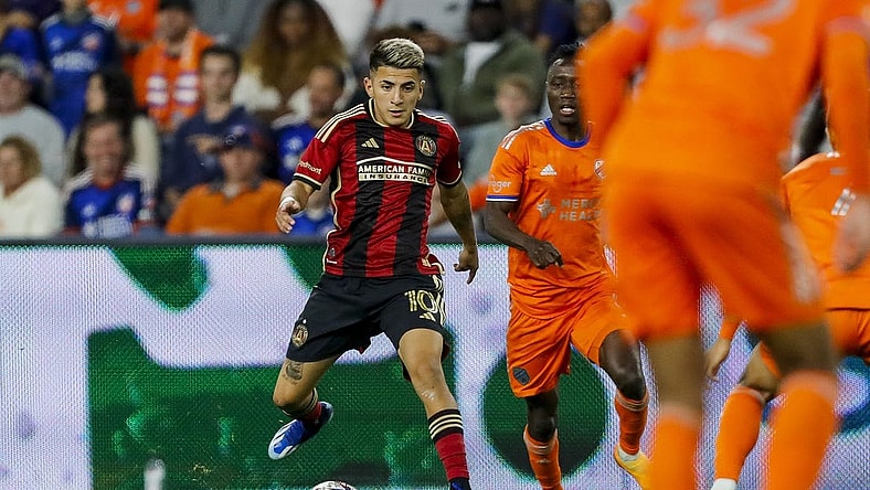 Oct 21, 2023; Cincinnati, Ohio, USA; Atlanta United FC midfielder Thiago Almada (10) dribbles against FC Cincinnati in the second half at TQL Stadium. Mandatory Credit: Katie Stratman-USA TODAY Sports