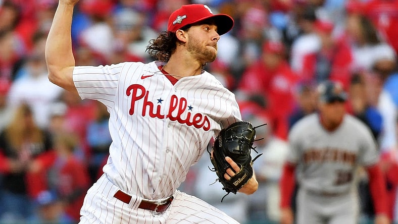 Oct 23, 2023; Philadelphia, Pennsylvania, USA; Philadelphia Phillies starting pitcher Aaron Nola (27) pitches during the first inning against the Arizona Diamondbacks in game six of the NLCS for the 2023 MLB playoffs at Citizens Bank Park. Mandatory Credit: Eric Hartline-USA TODAY Sports