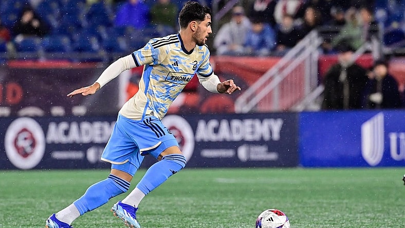 Oct 21, 2023; Foxborough, Massachusetts, USA; Philadelphia Union forward Julian Carranza (9) pushes the ball up field during the first half against the New England Revolution at Gillette Stadium. Mandatory Credit: Eric Canha-USA TODAY Sports