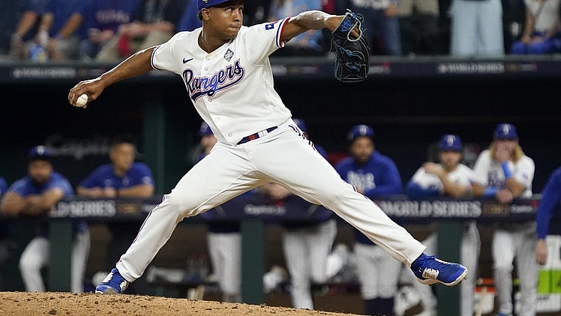 Oct 27, 2023; Arlington, TX, USA; Texas Rangers pitcher Jose Leclerc (25) throws during the tenth inning in game one of the 2023 World Series against the Arizona Diamondbacks at Globe Life Field.  Mandatory Credit: Raymond Carlin III-USA TODAY Sports
