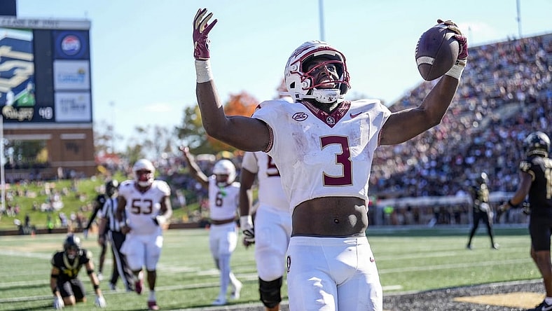 Oct 28, 2023; Winston-Salem, North Carolina, USA; Florida State Seminoles running back Trey Benson (3) celebrates after scoring against the Wake Forest Demon Deacons during the second half at Allegacy Federal Credit Union Stadium. Mandatory Credit: Jim Dedmon-USA TODAY Sports