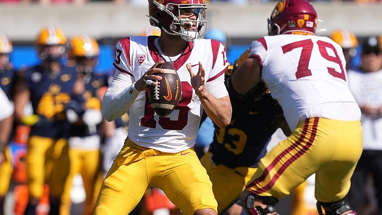Oct 28, 2023; Berkeley, California, USA; USC Trojans quarterback Caleb Williams (13) drops back to pass against the California Golden Bears during the first quarter at California Memorial Stadium. Mandatory Credit: Darren Yamashita-USA TODAY Sports