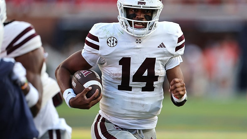 Oct 28, 2023; Auburn, Alabama, USA;  Mississippi State Bulldogs quarterback Mike Wright (14) carries against the Auburn Tigers during the third quarter at Jordan-Hare Stadium. Mandatory Credit: John Reed-USA TODAY Sports