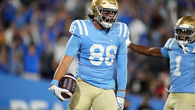 Oct 28, 2023; Pasadena, California, USA; UCLA Bruins tight end Moliki Matavao (88) celebrates after scoring on a 26-yard touchdown reception against the Colorado Buffaloes in the second half at Rose Bowl. UCLA defeated Colorado 28-16. Mandatory Credit: Kirby Lee-USA TODAY Sports